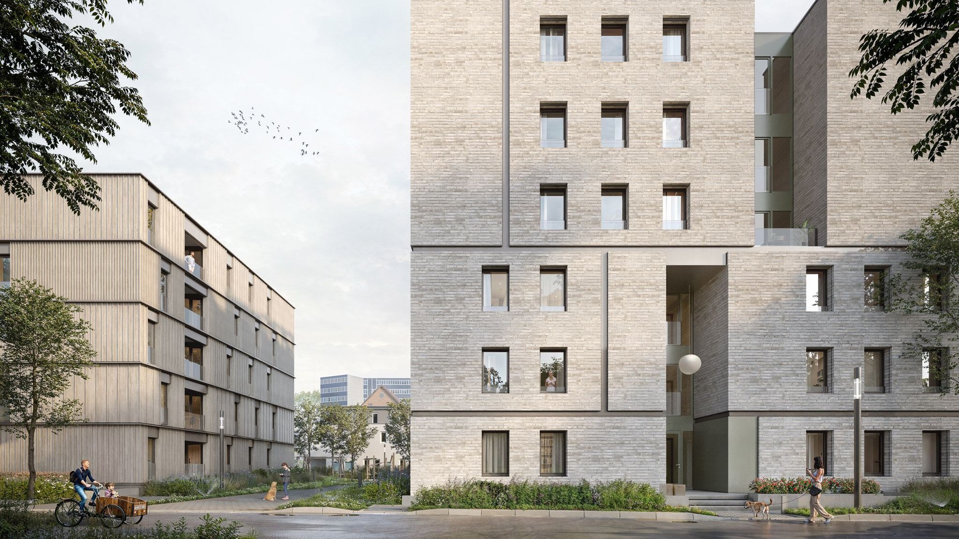 Hauseingang im Rücksprung der hellen Klinkerfassade, daneben ein Nachbargebäude mit Holzfassade